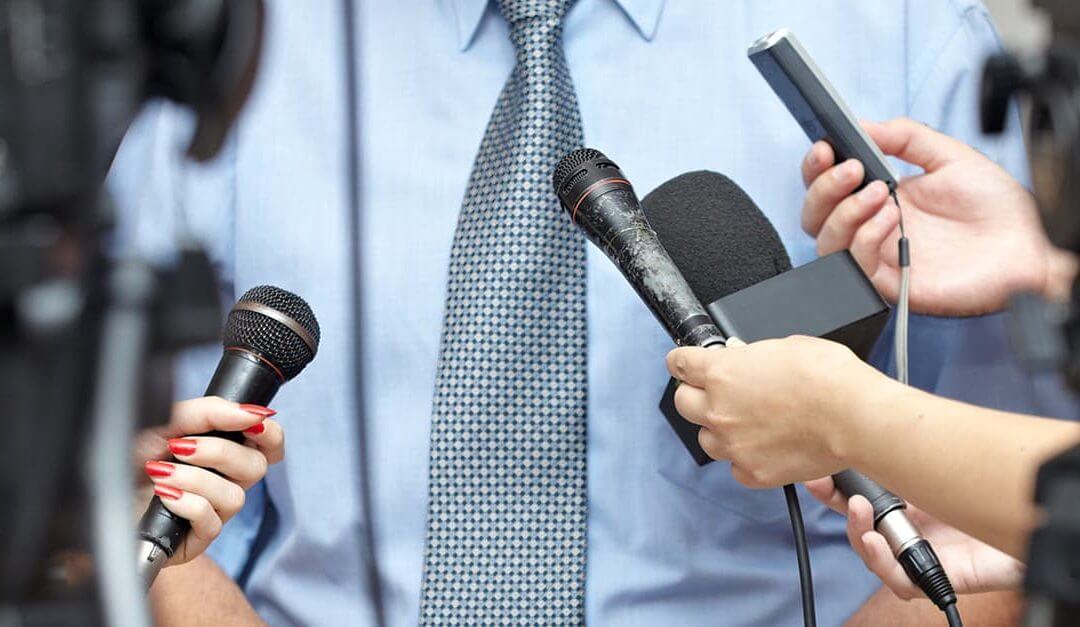 General Election 2015 - image - man in suit being interviewed with microphones