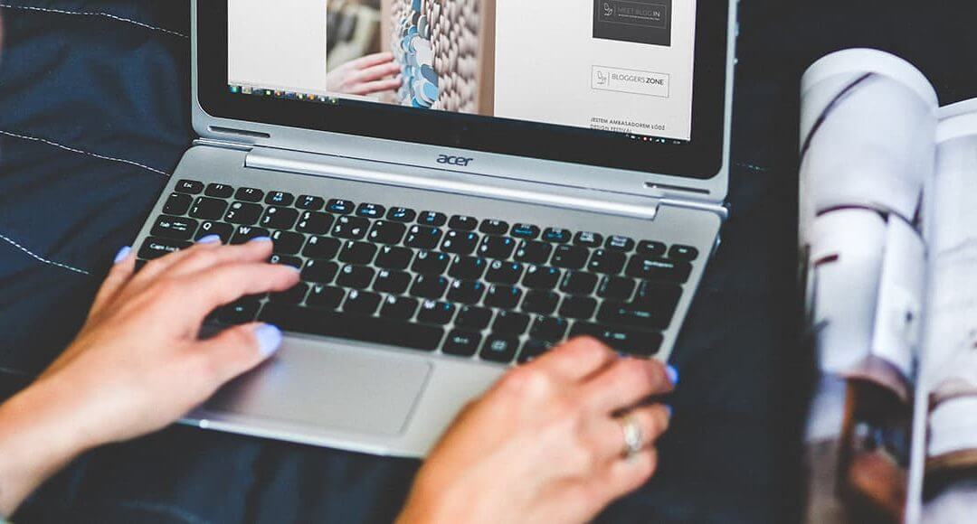 The Guardian's Women in Leadership Editor, Harriet Minter, on the Power of Part Time - image - Woman's hands working on a laptop