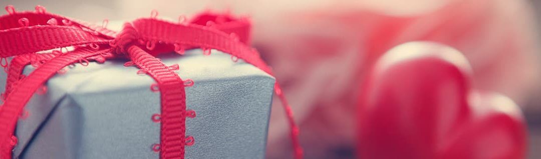 What Valentine’s Day Can Teach Us About Seasonal Business - image - blue present with pink bow