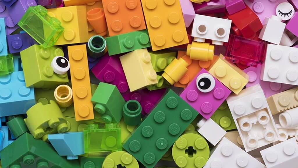 Brick By Brick: What Small Businesses Can Learn From Lego image - different coloured Lego pieces