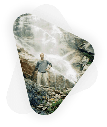 client business owner with waterfall in background